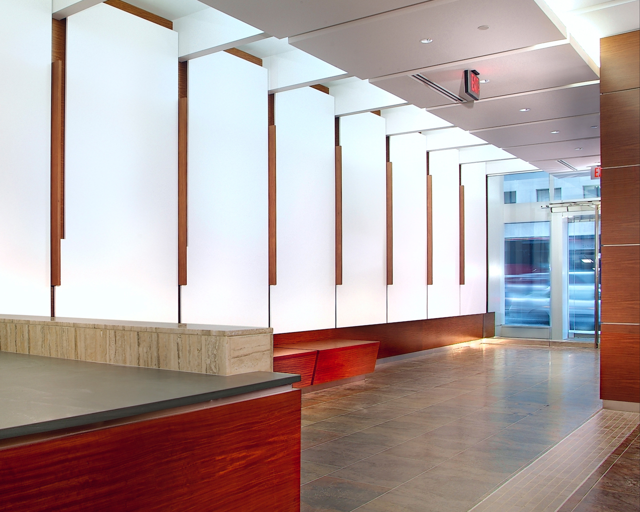 Bright interior of building with red wood accents