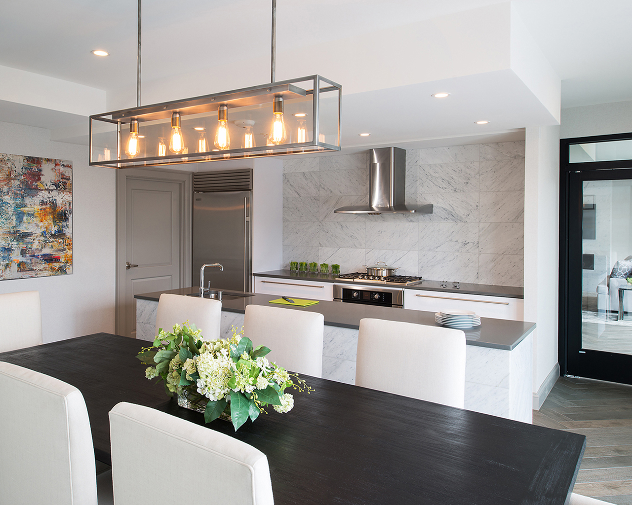 Brightly lit kitchen and dining room