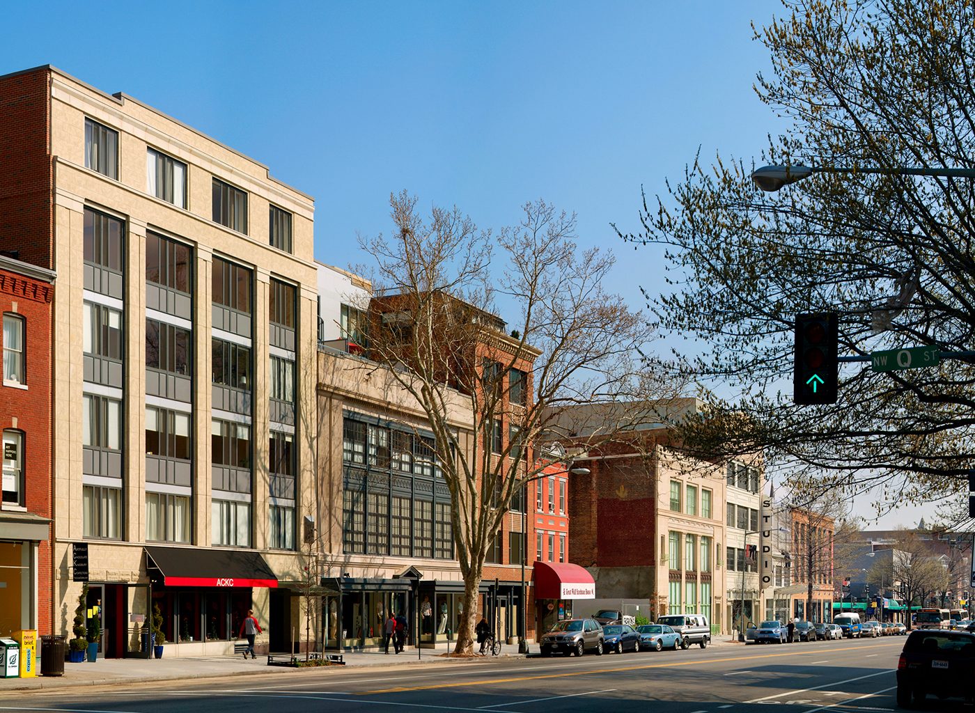 Series of buildings on busy city street
