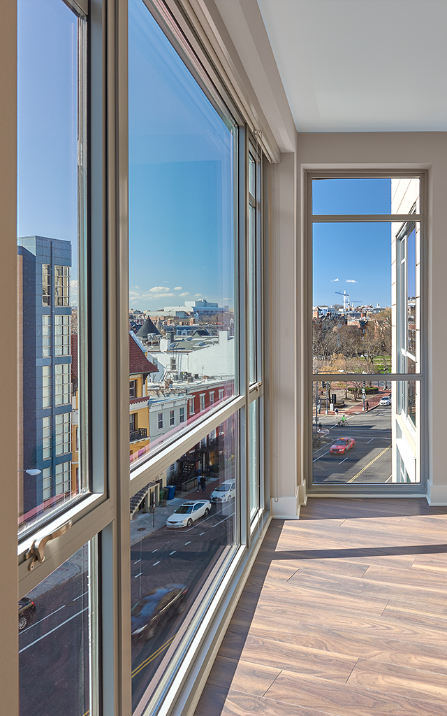 View from inside complex looking out onto busy DC street