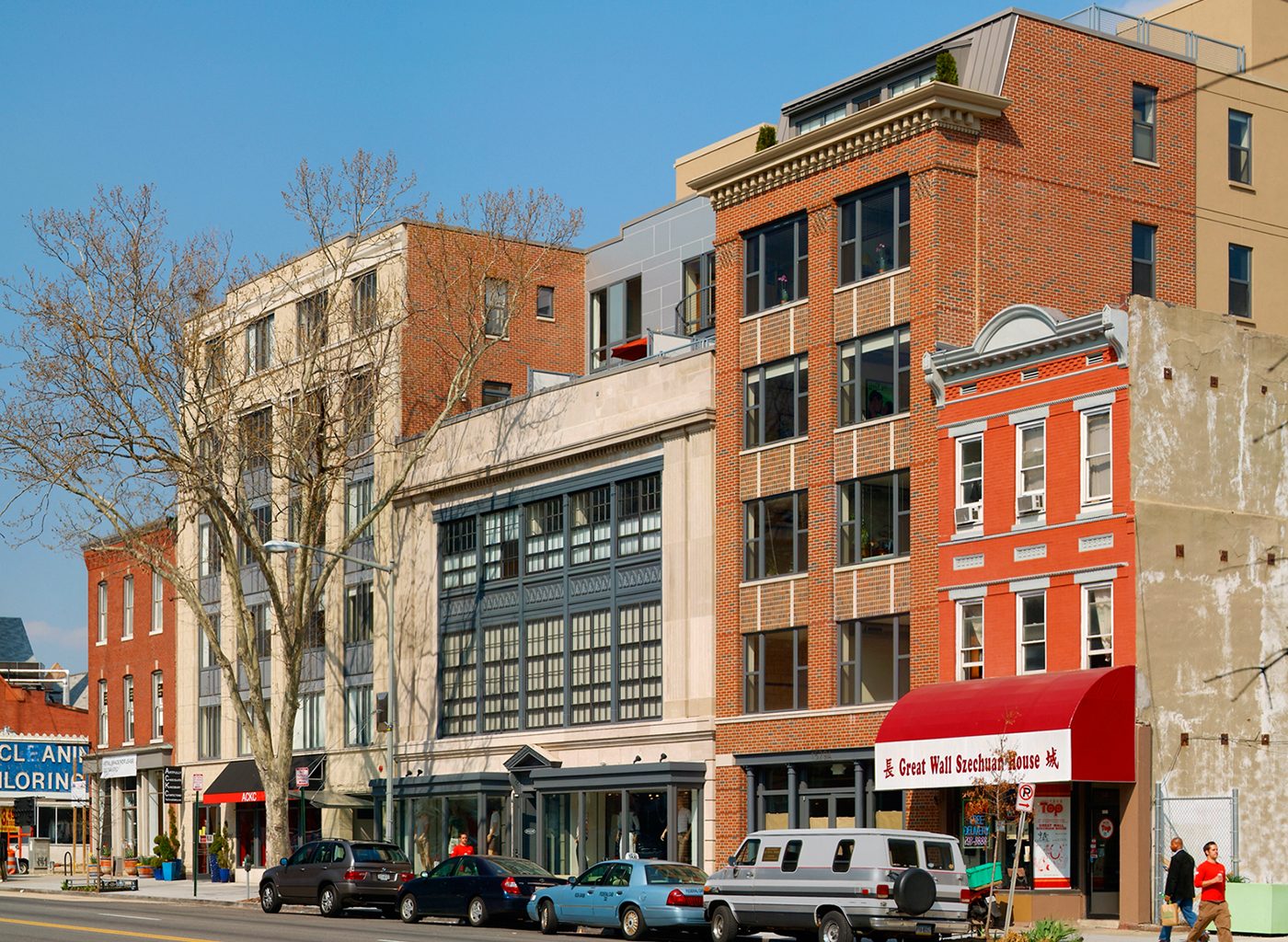 A block of buildings on busy city street