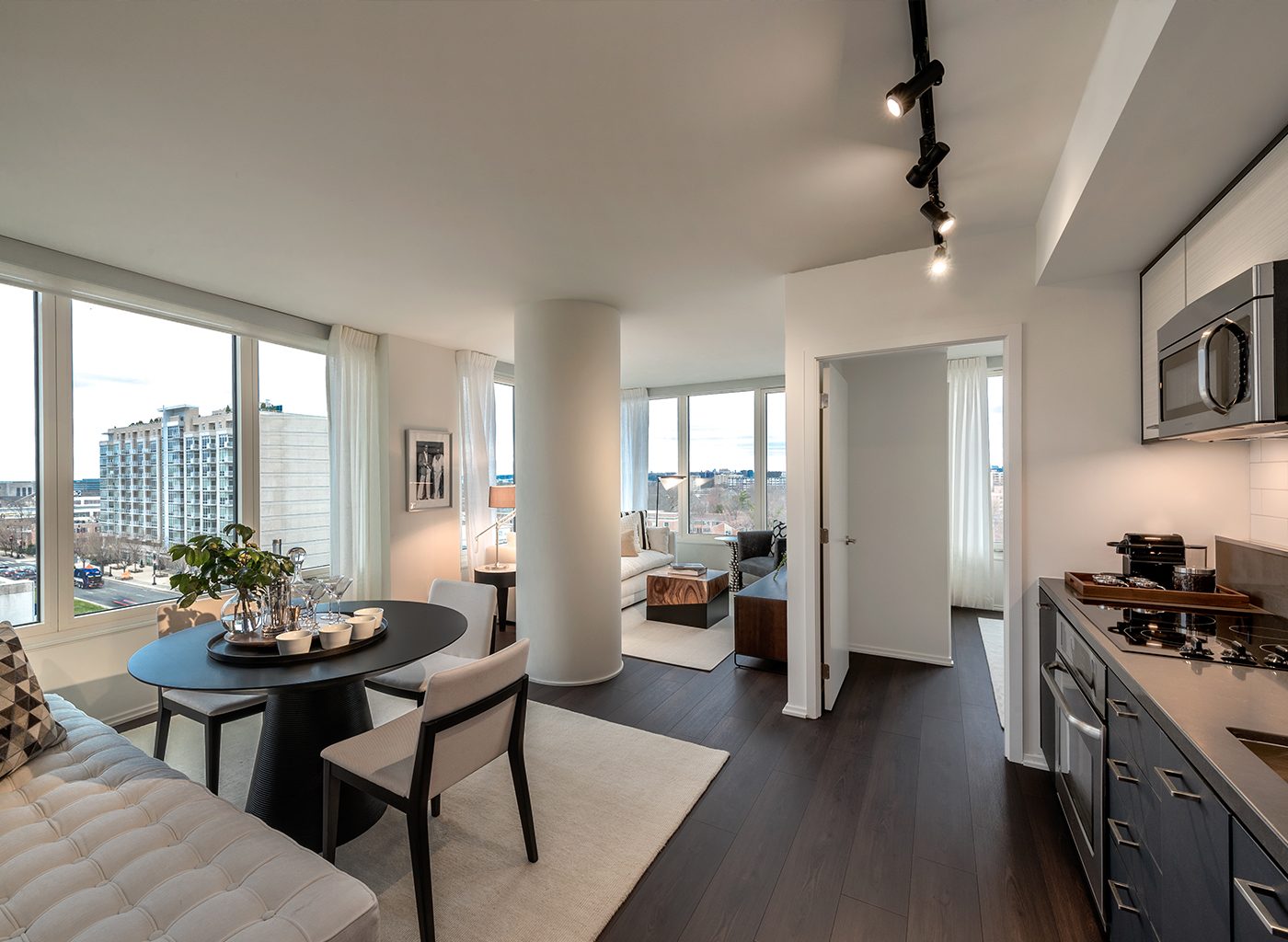 Brightly lit modern interior of building with white accents